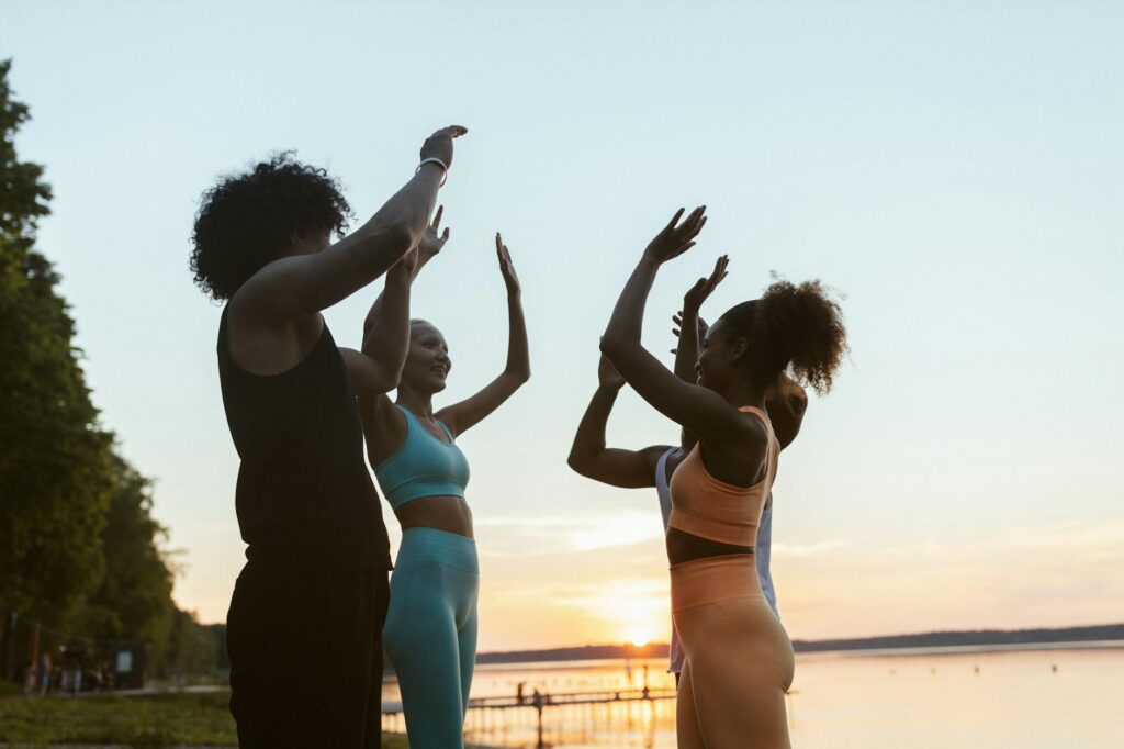 people raising their hands